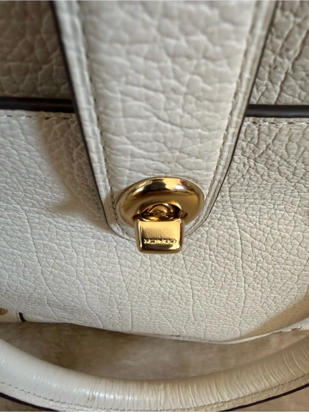 Coach structured pebbled